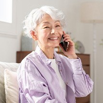 Woman smiling while on the phone