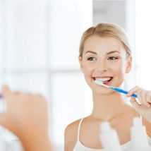 Man smiling at dentist during checkup