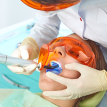 A woman getting a tooth-colored filling