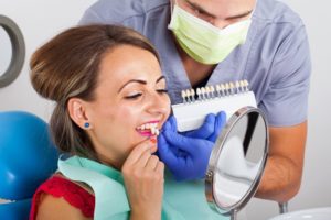 woman trying on veneers