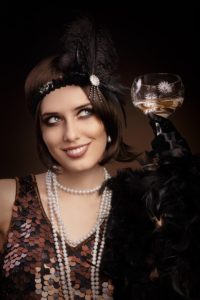 : retro 20s style woman champagne